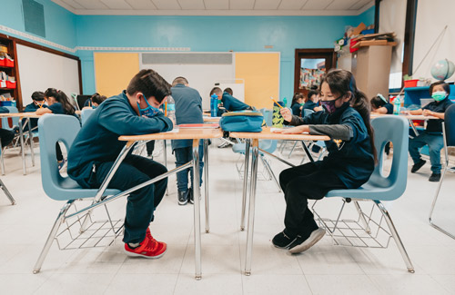 Morrill-students-sitting-at-facing-desks